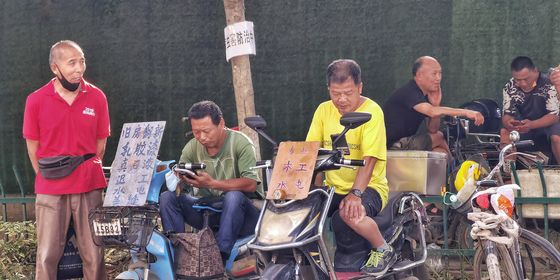 Migrant workers looking for work in Wuhan