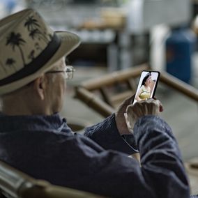 Elderly people on phone