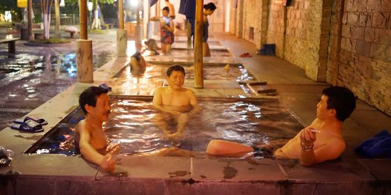 Chinese men in bathhouse