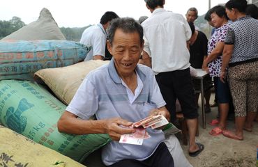 Farmer with cash