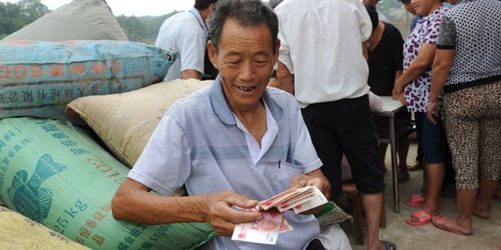 Farmer with cash